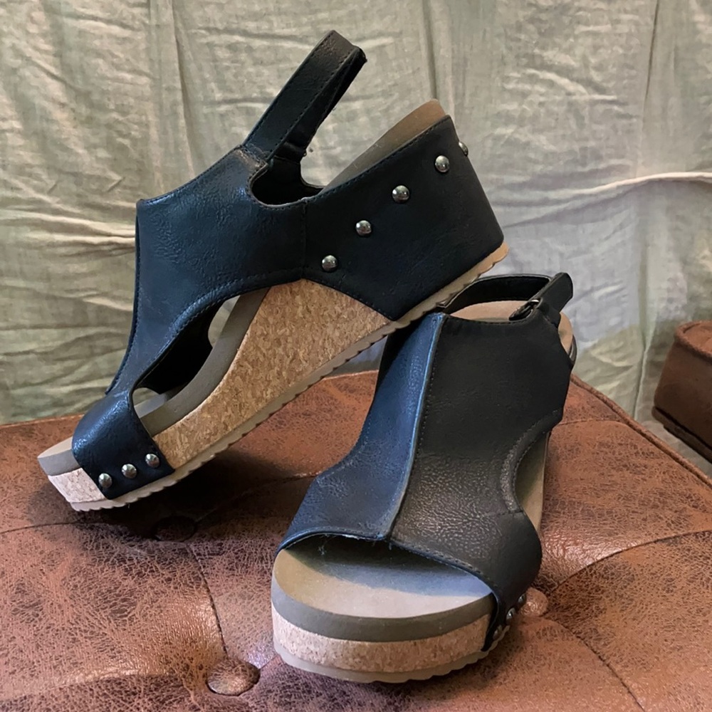 Black faux leather wedge shoes with cork bottom
